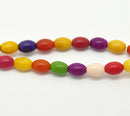 Small Gemstone Dyed Howlite Oval Rice Beads, 8mm x 6mm . 1 strand, 45 beads how0237