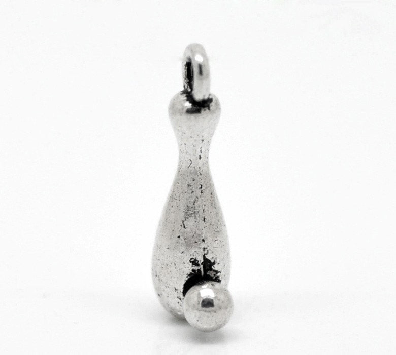 10 Silver Tone BOWLING PIN and Ball Charm Pendants . chs0350