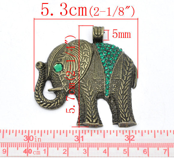 1 Large Rhinestone ELEPHANT Pendant . bronze tone metal, green crystals.  CHB0143