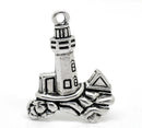 2 LIGHTHOUSE and OCEAN Charm Pendants . chs0266