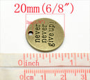 10 pc.  Antique Bronze Tone Metal Stamped Never NEVER GIVE Up Circle Charm Pendants . chb0256