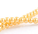 6mm YELLOW HONEYSUCKLE Round Glass Pearls . long 32" strand . about 145 beads . Bgl0426