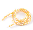 6mm YELLOW HONEYSUCKLE Round Glass Pearls . long 32" strand . about 145 beads . Bgl0426