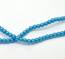 4mm PEACOCK BLUE Round Glass Pearls . long 32" strand . about 210 beads . Bgl0401