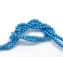 4mm PEACOCK BLUE Round Glass Pearls . long 32" strand . about 210 beads . Bgl0401