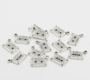 5 Silver Tone Metal RETRO CASSETTE Tape Charms or Pendants . chs0082