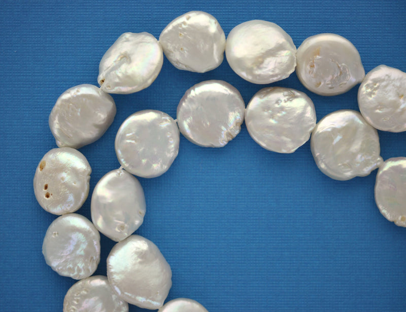 4 Cultured Freshwater Pearls . Round Coin Disc Shape . Off White with pretty pearly surface. 16mm gpe0019
