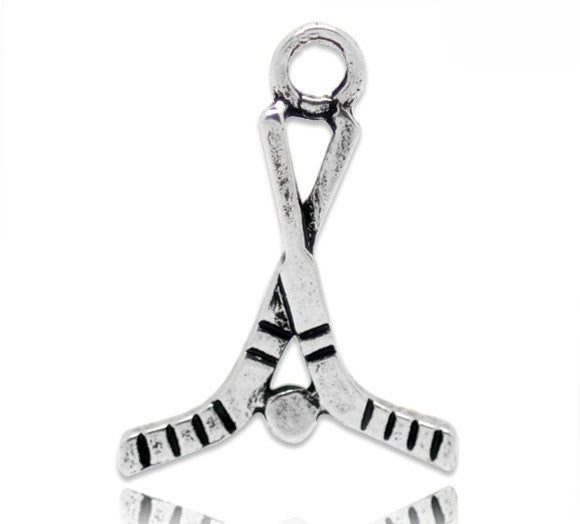 10 Silver Tone Hockey Sticks and Puck Charms Pendants . chs0089