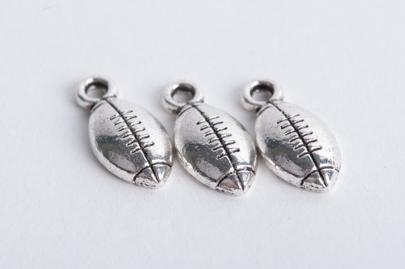 10 Silver Tone Metal FOOTBALL Charm Pendants chs0155