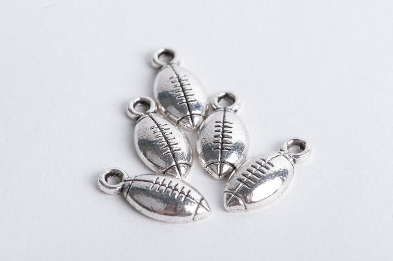 10 Silver Tone Metal FOOTBALL Charm Pendants chs0155