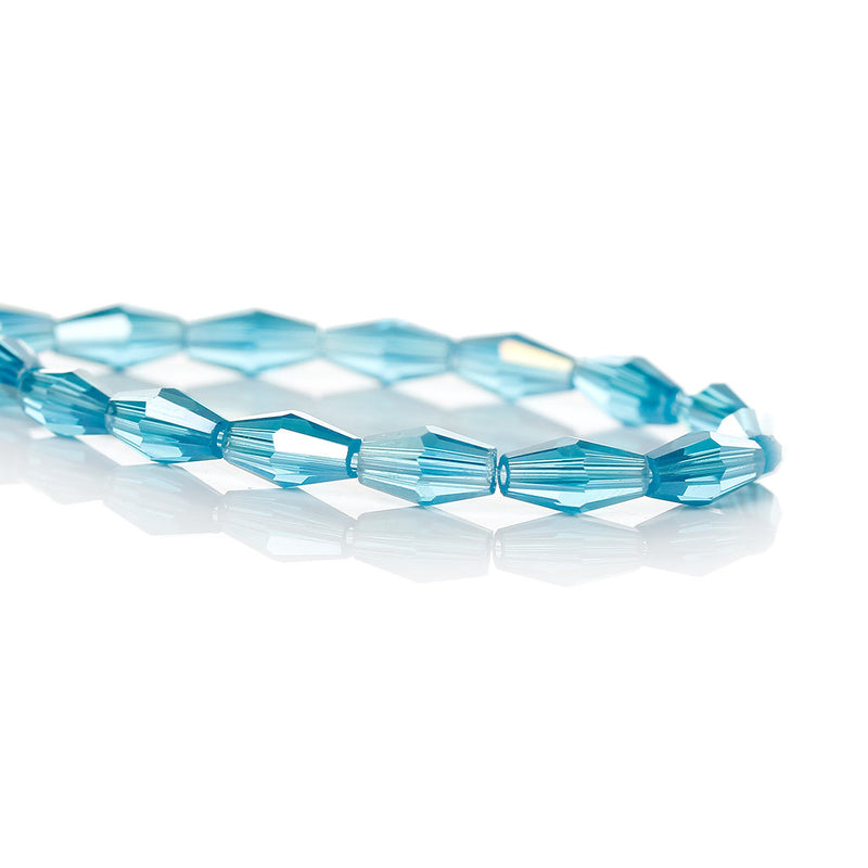 22" Strand Crystal Elongated Bicone Beads . AQUAMARINE BLUE AB 8mm x 4mm about 75 beads, bgl0045