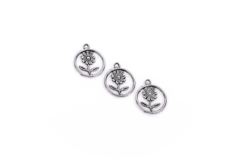 10 Small Antique SILVER Metal FLOWER Circle Charms . 21mm x 18mm chs1083