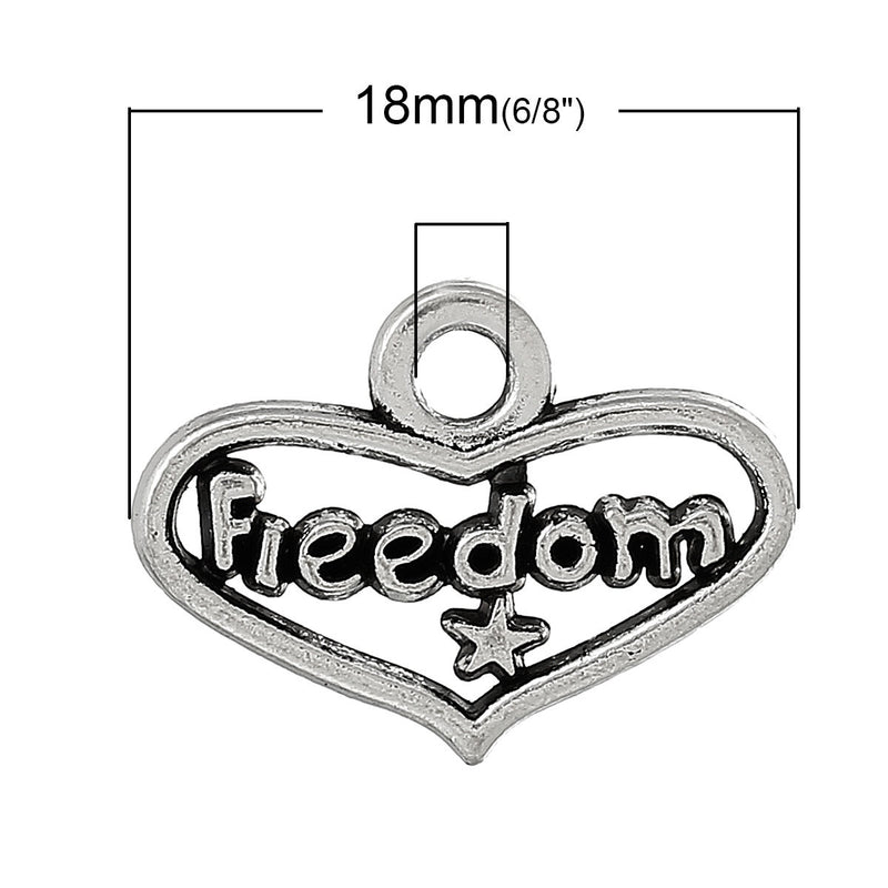 10 Small Silver Tone FREEDOM Heart Cut Out Charms Pendants chs1170