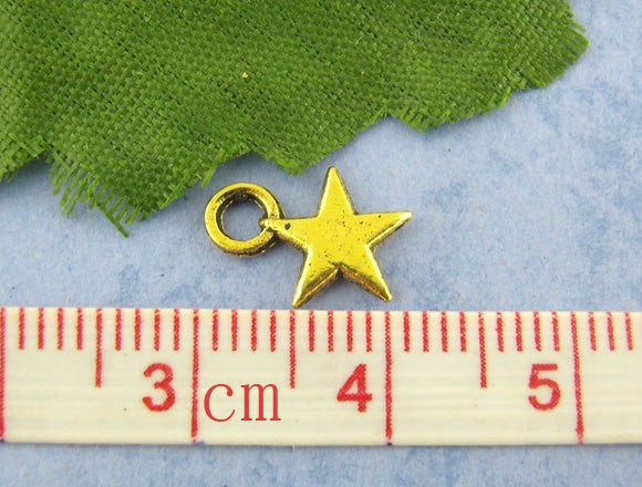 20 Small Gold Tone STAR Charm Pendants  chg0120