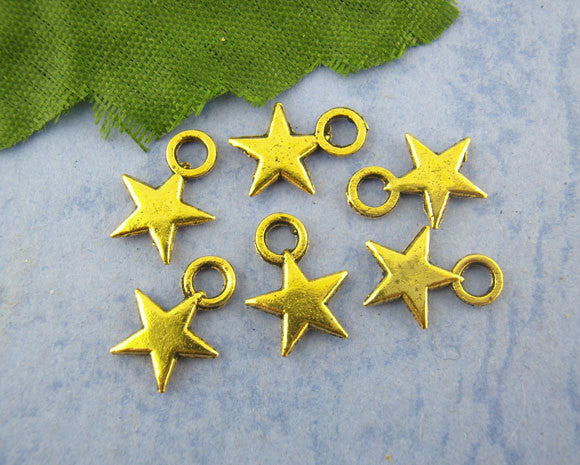 20 Small Gold Tone STAR Charm Pendants  chg0120