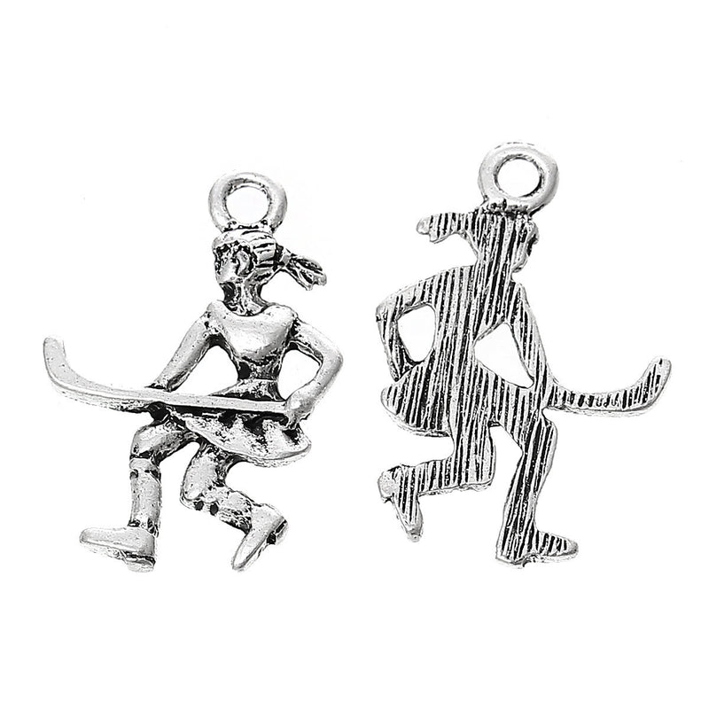 10 Antique Silver Female FIELD HOCKEY Player Charm Pendants  chs1526