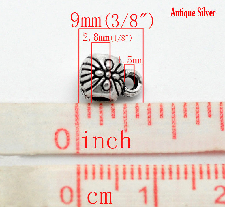 100 Silver Tone Bail Beads, flower pattern carved in the design, 9x6mm, fba0054