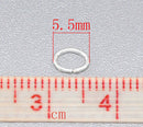 50 OVAL Silver Plated Open Jump Rings 5.5mm x 4mm, 21 gauge wire,  jum0155a