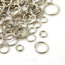 Silver Plated Jump Rings, assorted sizes in storage box, over 600 pcs, jum0227